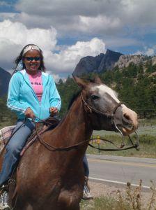 woman riding a horse